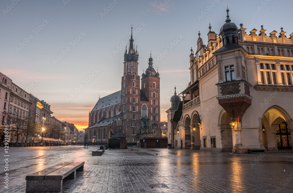 St Mary's church and Cloth Hall on Main Market Square in Krakow, illuminated in the morning