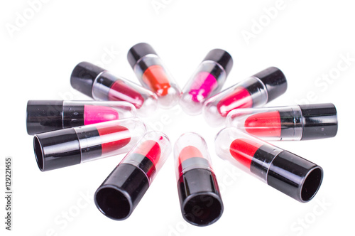 Lipstick colors arranged in a circle and isolated on a white background