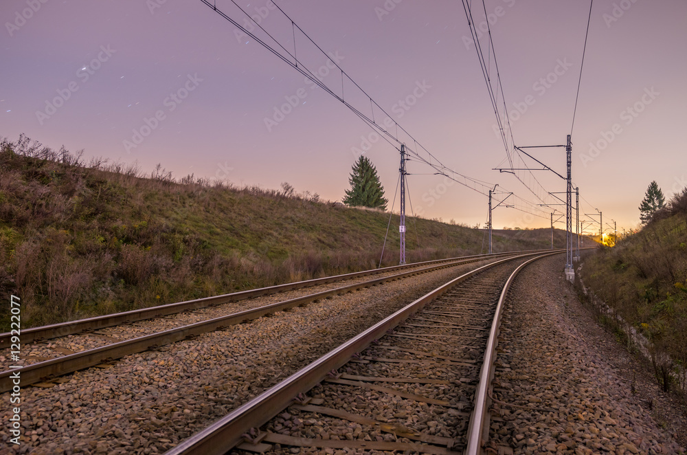 Fototapeta premium Railroad track in the night