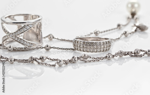 Unusual beautiful silver chain and a silver ring with gems