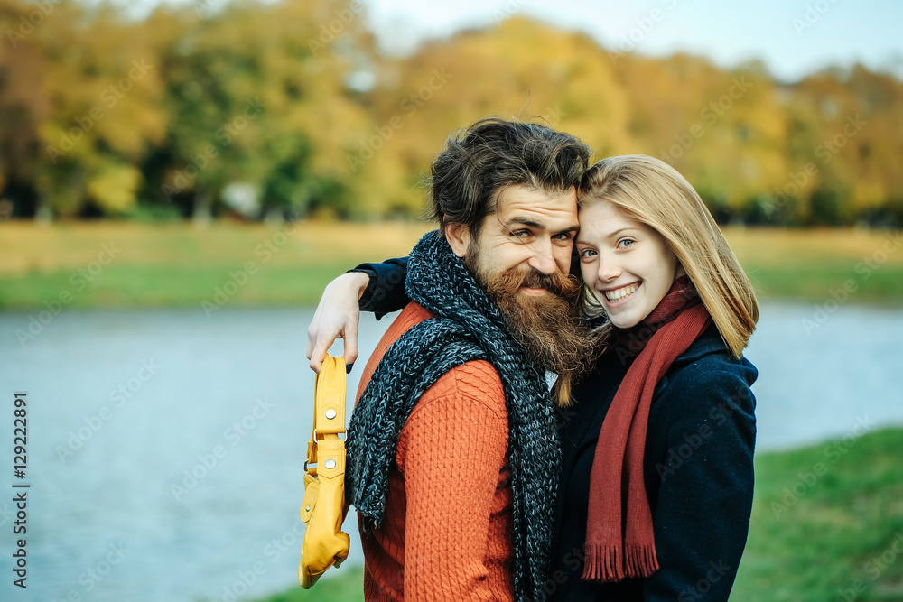 Fototapeta premium Young couple in autumn park