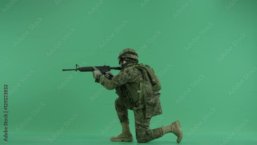 combatant targeting at the side on green screen back ground combatant targeting at the side on green screen back ground