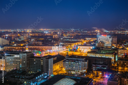 Night cityscape from rooftop to Lenin square. Houses, trade centers © Mulderphoto