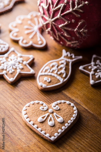 Christmas sweet cakes. Christmas homemade gingerbread cookies on wooden table.