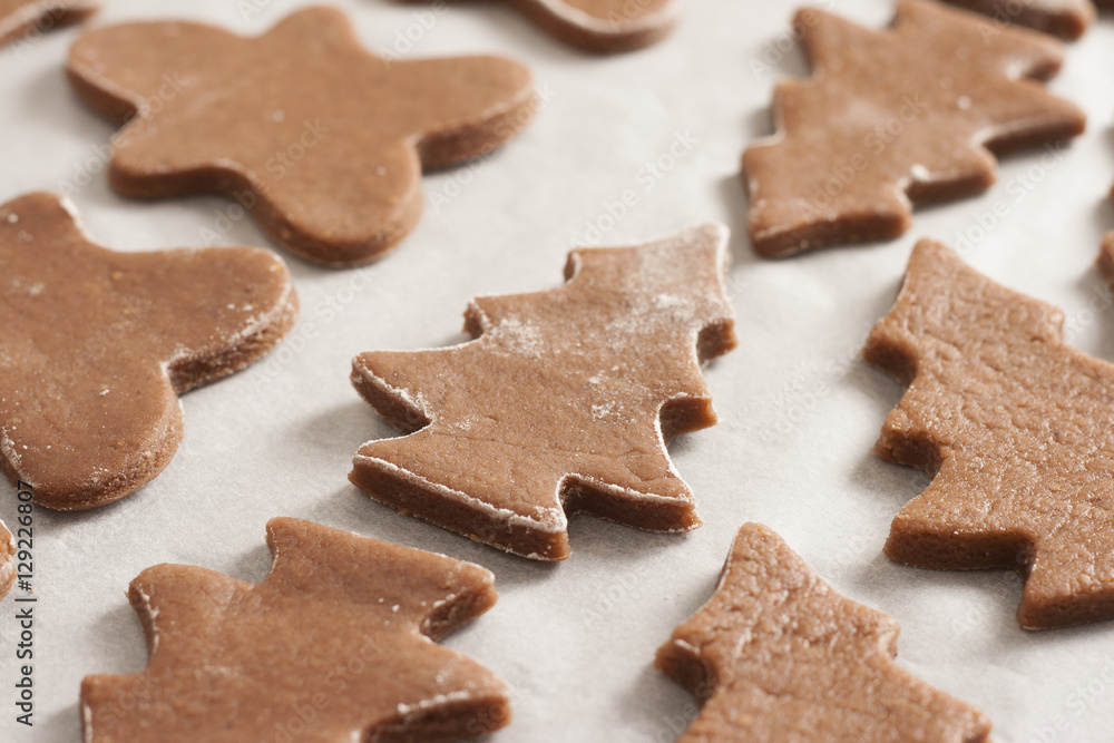 christmas gingerbread cookies baking process , dough and rolling pin,shallow depth of field. christmas gingerbread cookies baking process , dough and rolling pin,shallow depth of field.