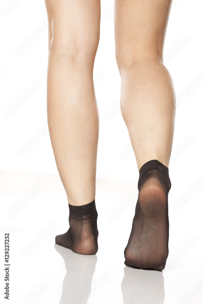 female feet in short nylon socks Stock Photo | Adobe Stock
