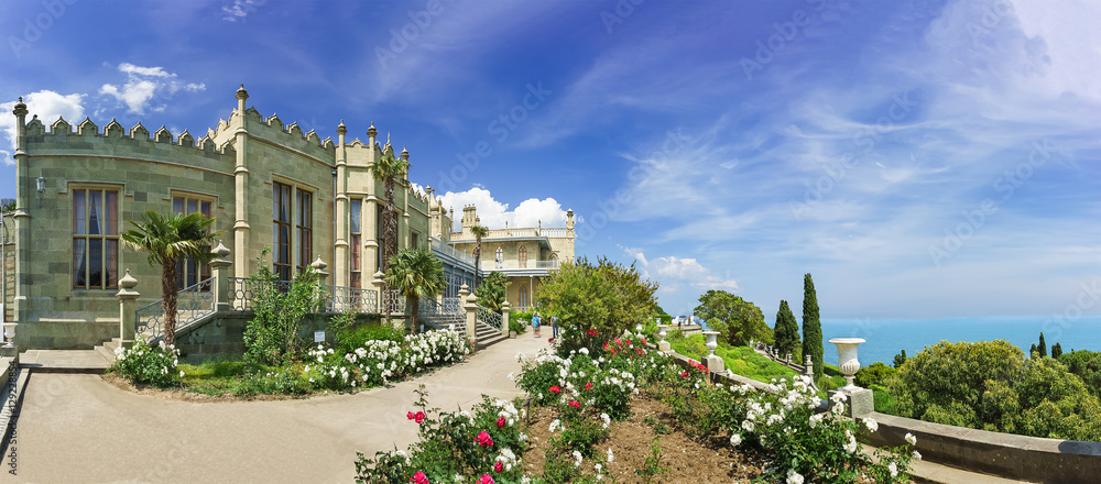 Fototapeta premium flower Beds with roses on the southern terraces of the Vorontsov Palace. Yalta, Alupka, Crimea, Russia