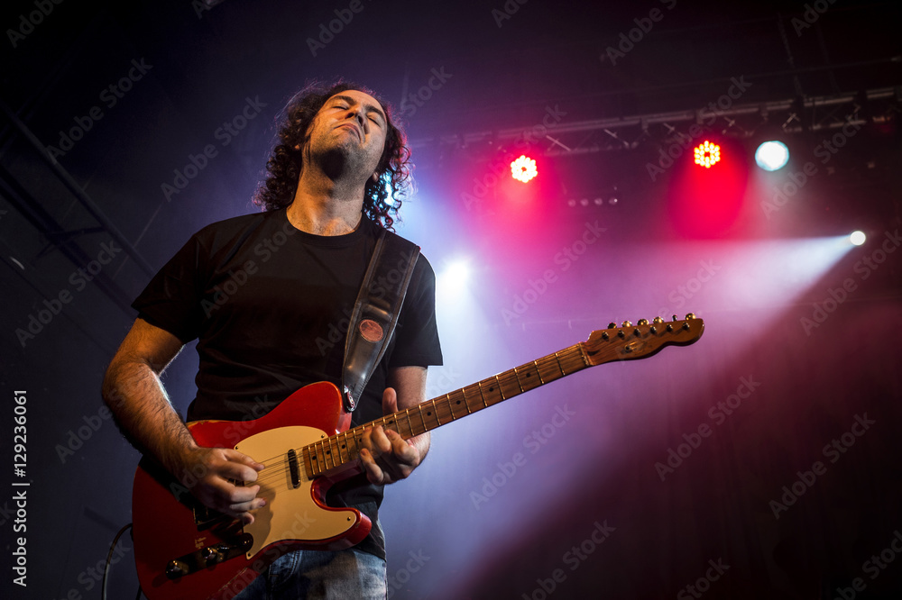Obraz premium Guitarist playing live