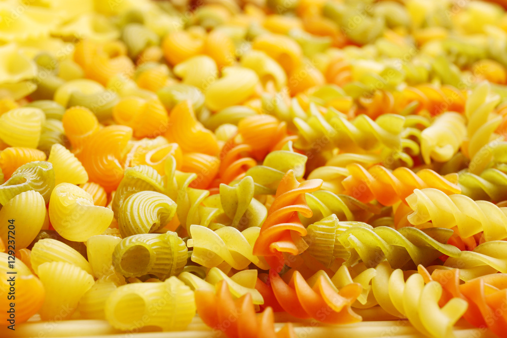 Raw pasta background, closeup Raw pasta background, closeup