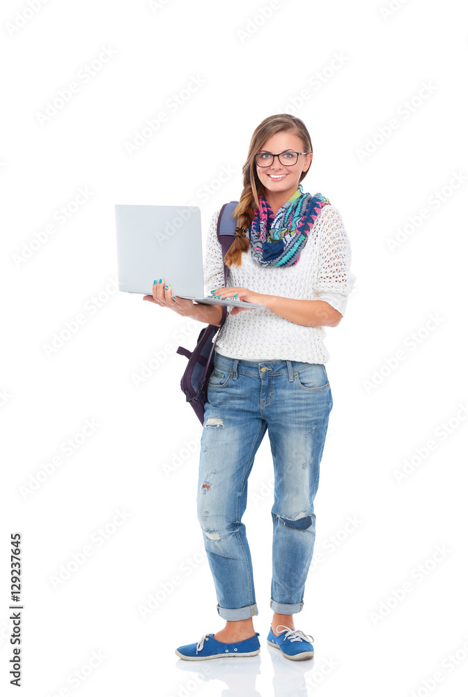 Smiling teenager with laptop on white background Smiling teenager with laptop on white background