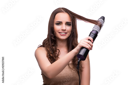 Young beautiful woman with hair dryer isolated on white