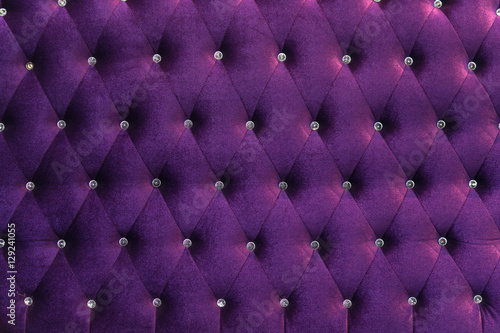 deep Purple velvet texture of sofa closeup shot - luxury violet velvet texture with diamond jewelry background.
