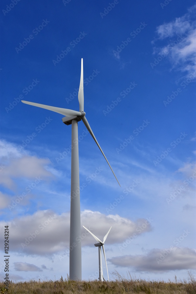 wind turbines producing clean renewable energy on the northern plains. wind turbines producing clean renewable energy on the northern plains.