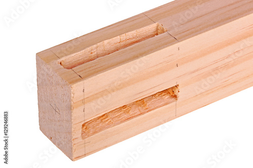 Tableau sur toile Close-up of a board with a woodworking mortises isolated
