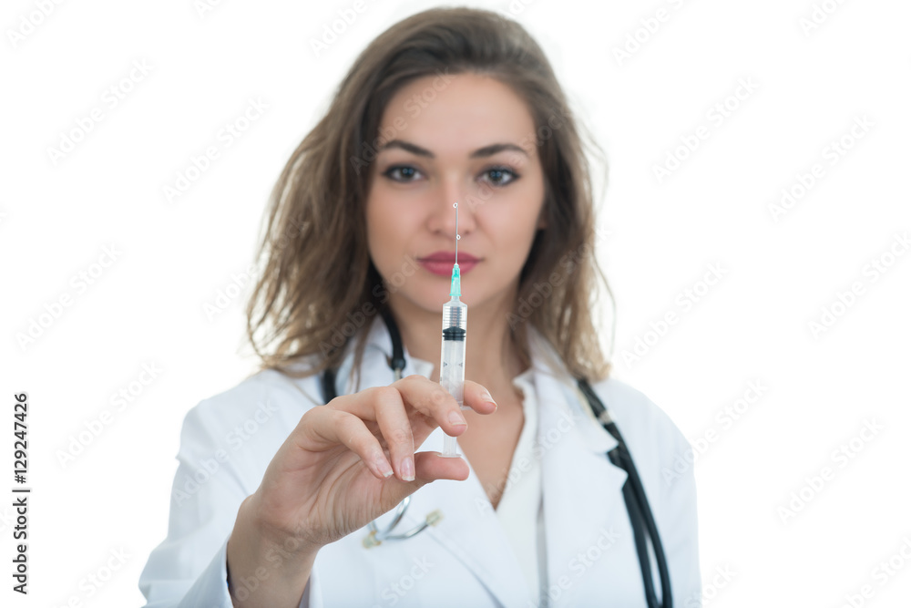 Female doctor checking a syringe isolated on white background Female doctor checking a syringe isolated on white background