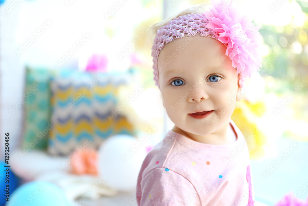 Portrait of one year-old baby girl indoors Portrait of one year-old baby girl indoors
