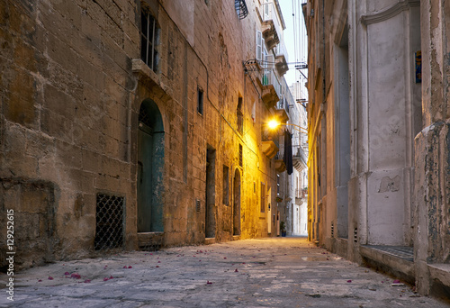 The narrow street Is - Sirena on Senglea in the early morning. Malta