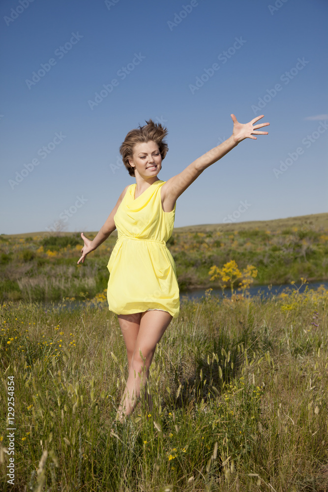 Happy young fresh female enjoying the fresh air on nature Happy young fresh female enjoying the fresh air on nature