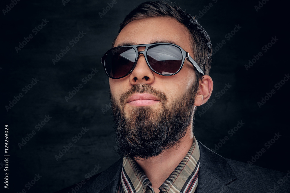 Fototapeta premium Close up portrait of bearded male in sunglasses.
