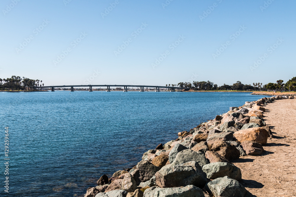 Rocky shoreline on Mission Bay in San Diego, California.
