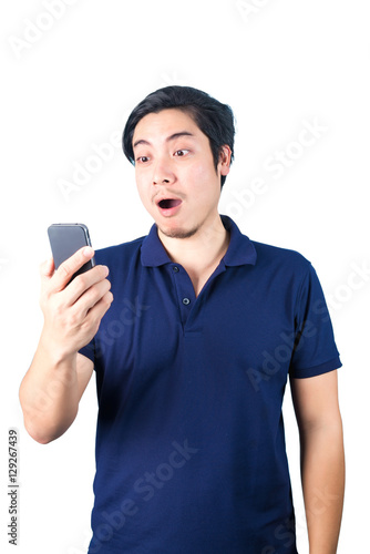 Asian guy with mobile phone in hand isolated on white background