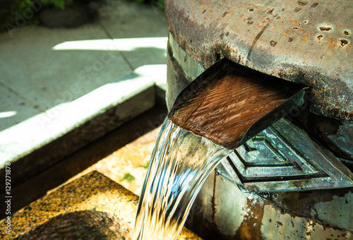 A place for ritual cleansing of hands and mouth with water when visiting temples.