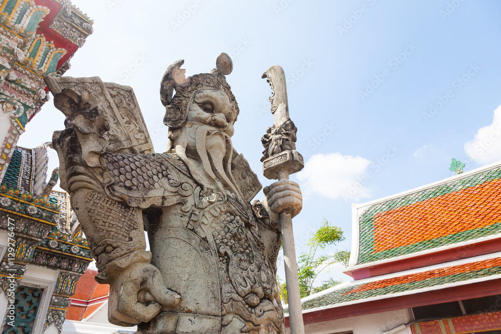 Naklejka premium Chinese Warrior Statue In The Wat Pho