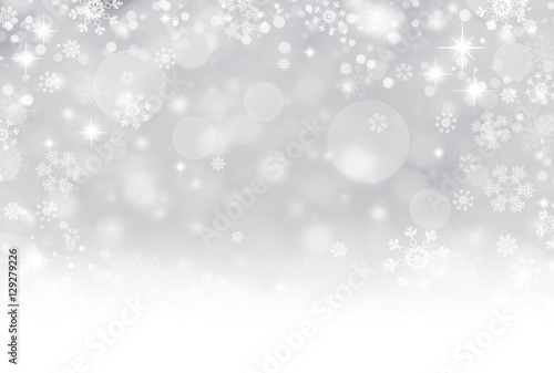 Abstract Winter background abstract bokeh. Snow, blurred lights with snowflakes. Christmas background
