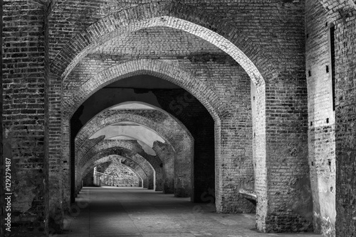 An ancient fortified tunnel in Vigevano,Italy.Black and white photo. photo