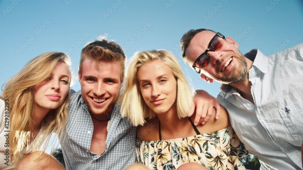 Cheerful young people enjoying the summer time Cheerful young people enjoying the summer time