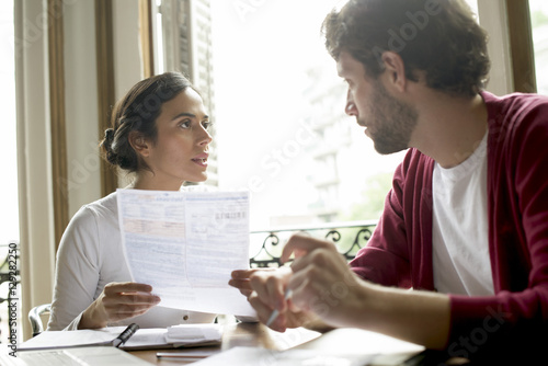 Couple discussing family financial issues