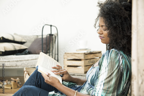 Woman reading novel photo