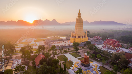 the highest pagoda in the world.pagoda has gold color..the temple and pagoda are building in the large field in the embrace of the mountains.