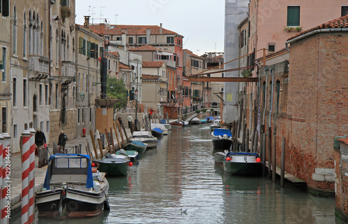 the narrow water canal in Venice