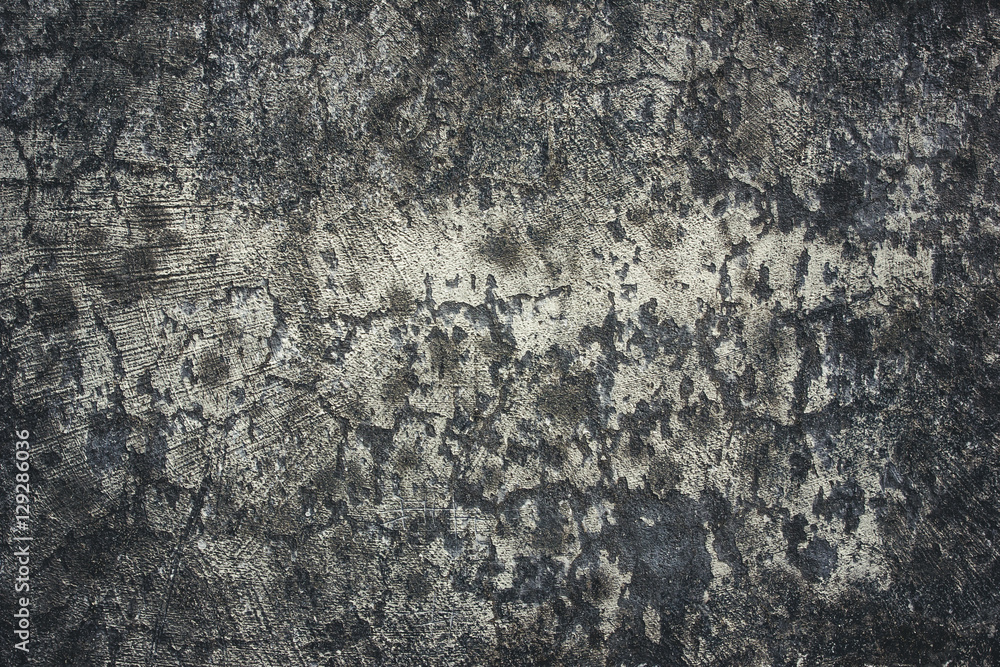 Fototapeta premium Grunge dirty cracked concrete wall with peeling paint background.