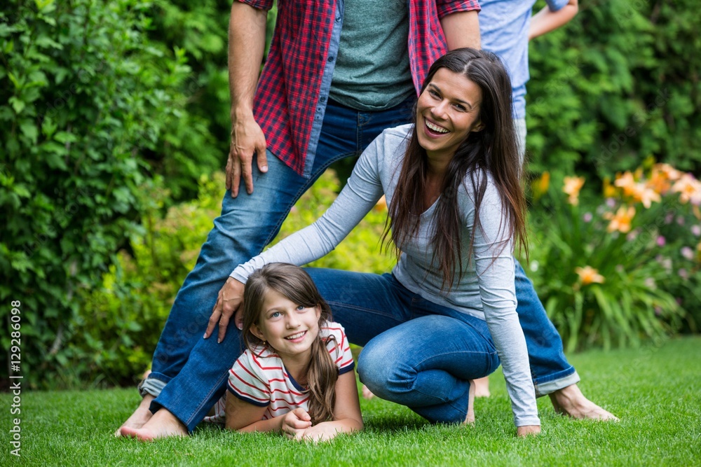 Fototapeta premium Happy family having fun in park
