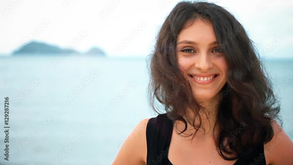 Portrait of happy cute lady looking at camera and smiling Portrait of happy cute lady looking at camera and smiling