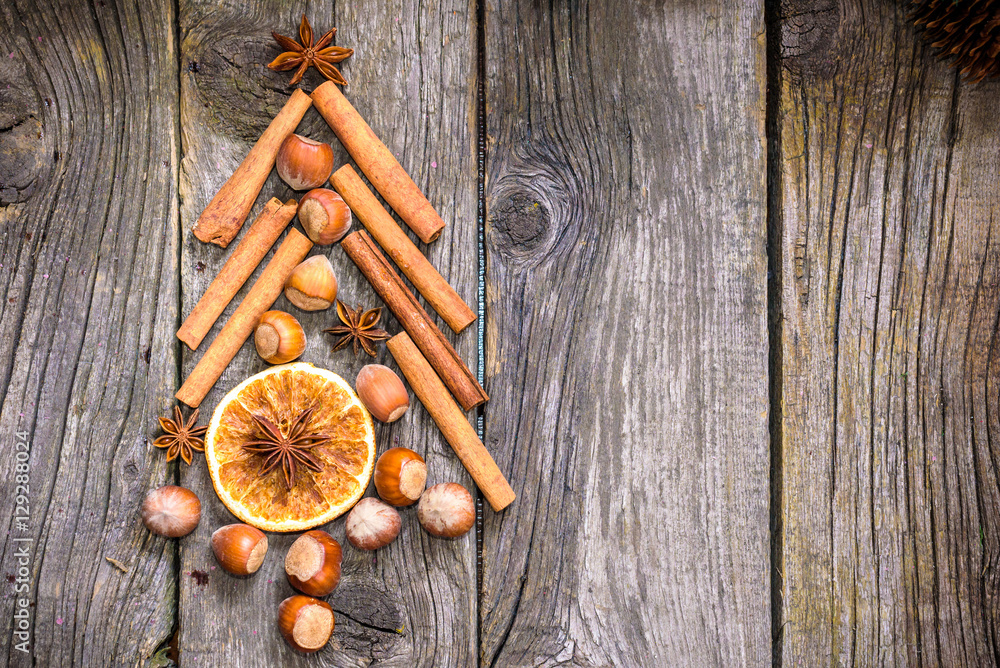 Christmas tree made of nuts, spices and dried oranges. Christmas tree made of nuts, spices and dried oranges.