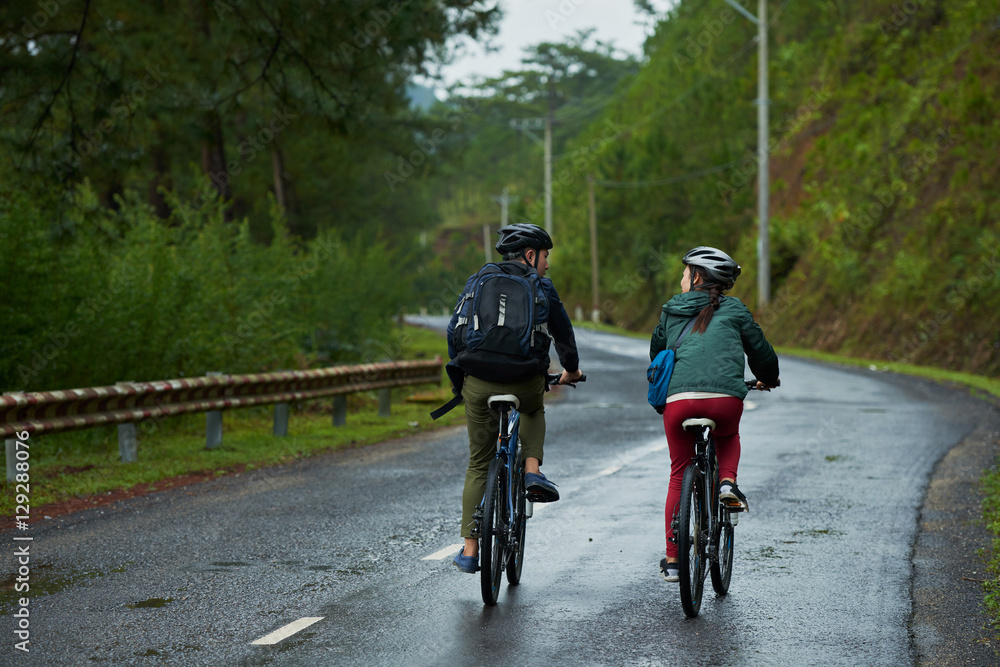 Couple on bikes