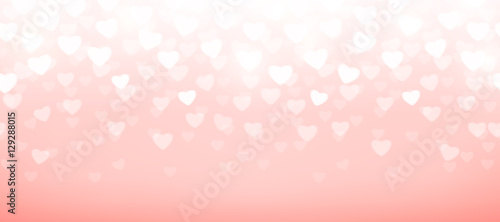Vector illustration of pink background with light hearts