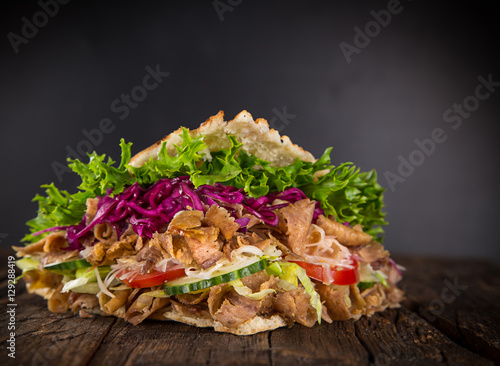 close up of kebab sandwich.