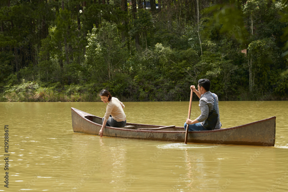 Couple enjoying boating