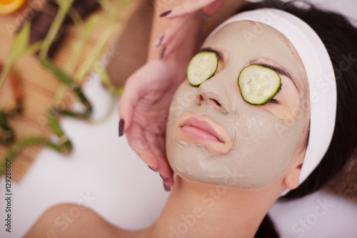 Young beauty woman in a spa with closed eyes