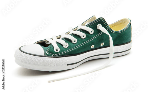 Green sneaker on a white background
