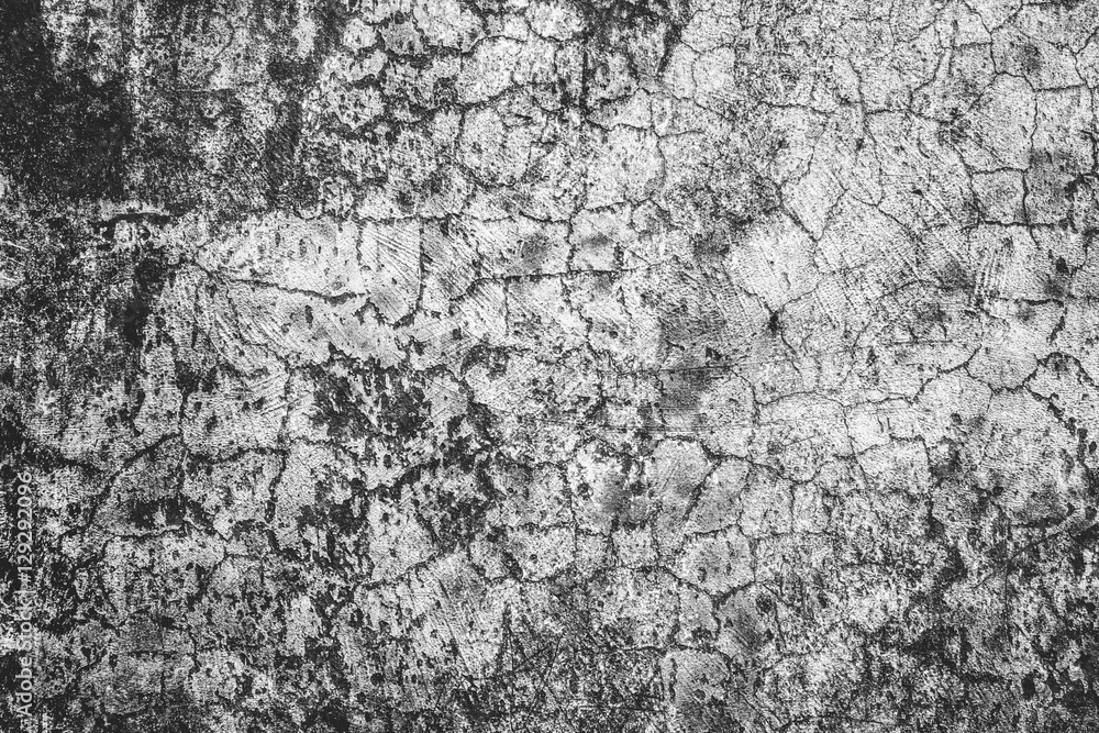 Dirty cracked concrete wall background.