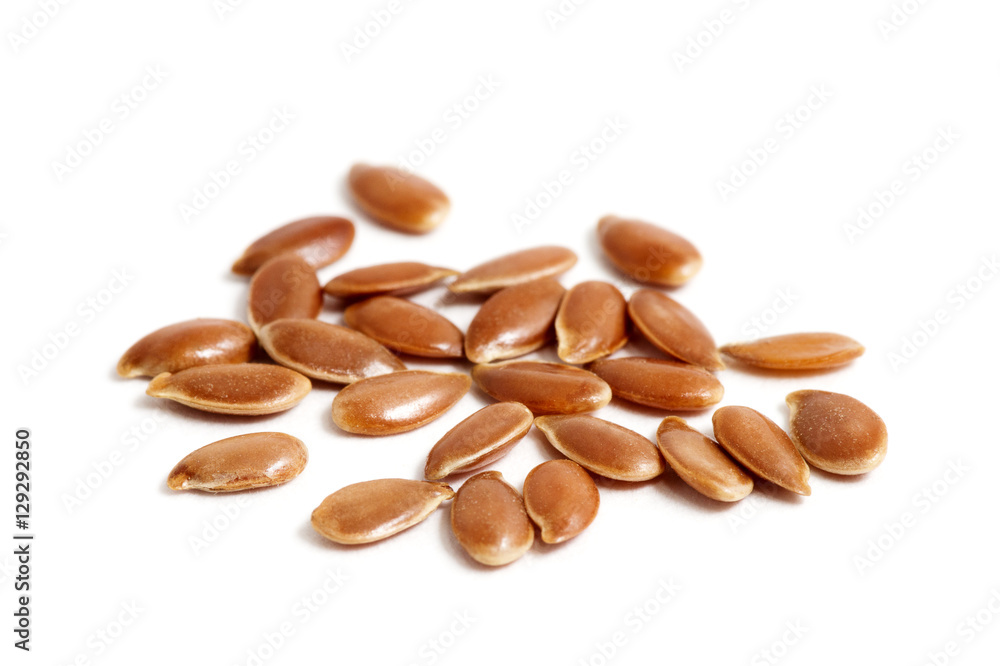Flax seeds heap isolated on white Flax seeds heap isolated on white