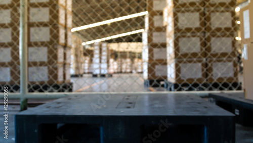 soft focus of industrial pallet in warehouse
