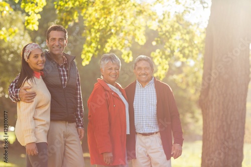 Portrait of happy family at park photo