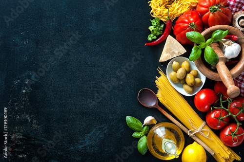 Fototapeta Naklejka Na Ścianę i Meble -  Italian food ingredients on slate background