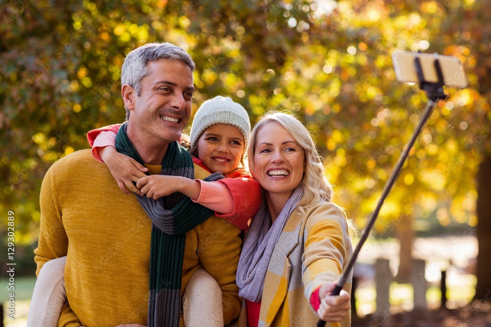 Smiling family taking selfie Smiling family taking selfie